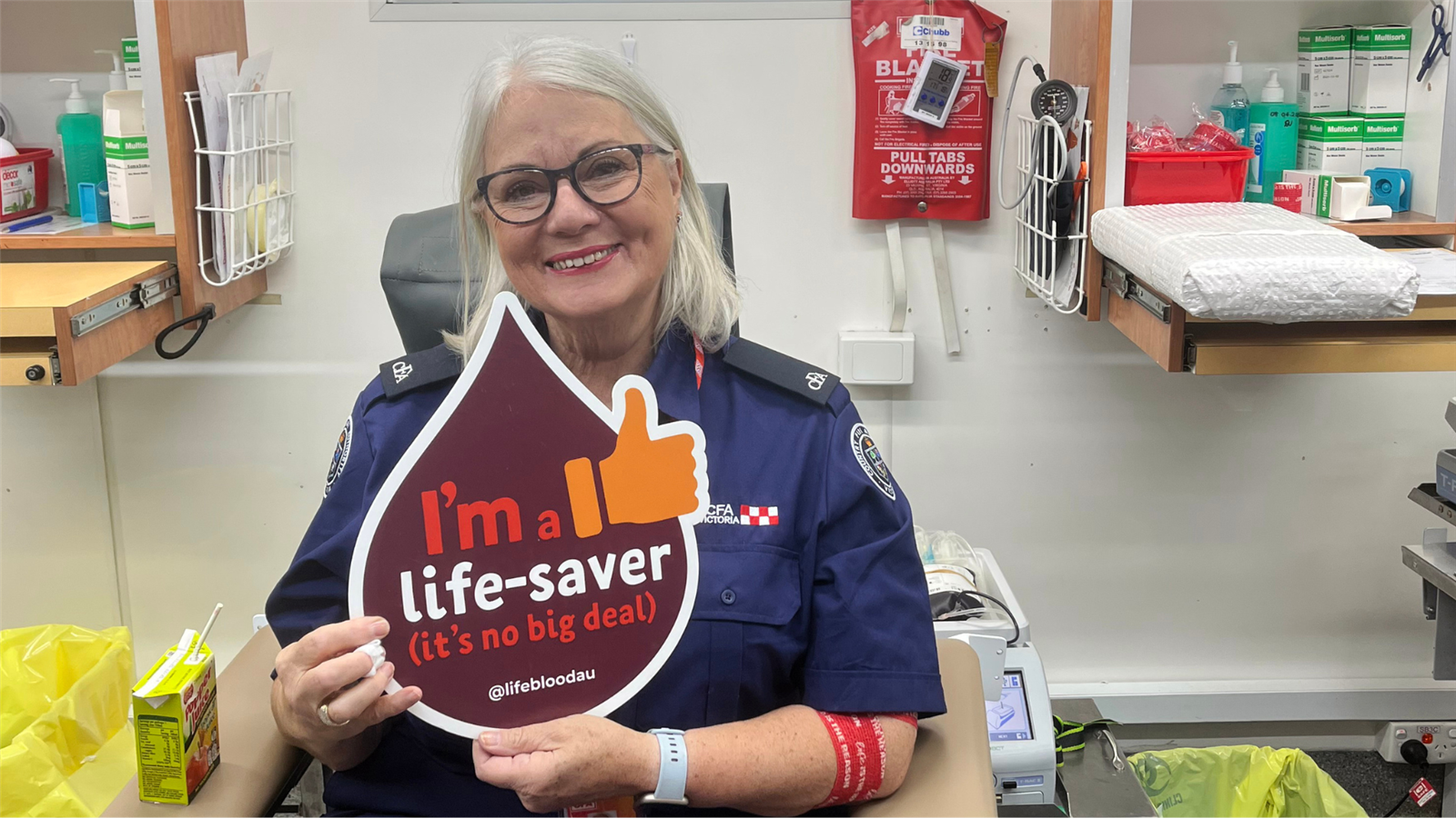 Lyn Krejci donating blood as part of the Emergency Services Blood Drive